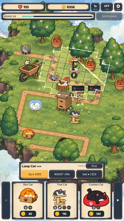 Tap a cat to upgrade, boost or sell it; its reach is drawn on the tiles.